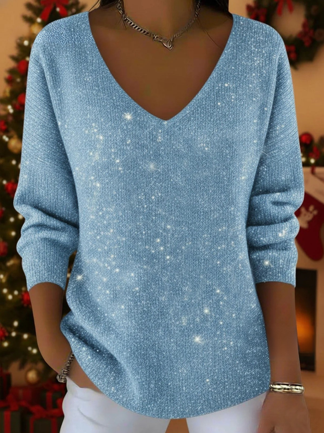 Amara — El jersey festivo con escote en V para brillar en Navidad